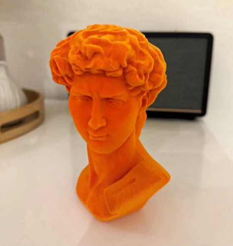 Orange resin male head bust - male,