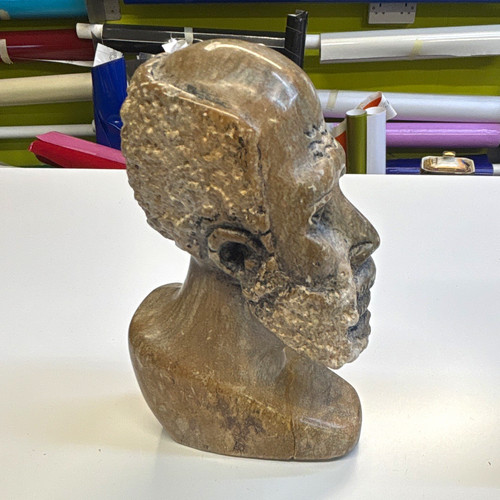 Carved stone head - stone,
