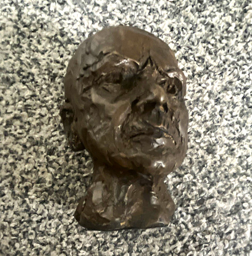 Brown metal male head bust - metal,